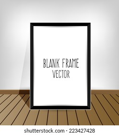 white frame on a wall and floor