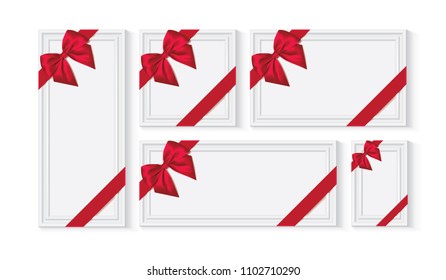 white frame with a red bow
