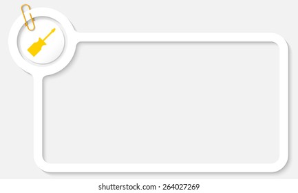 white frame for text and yellow screwdriver