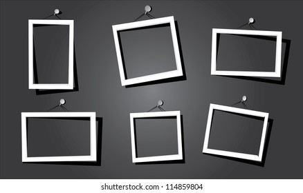 white frames on the black wall. vector illustration.