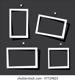 white frames on the black wall. vector illustration.