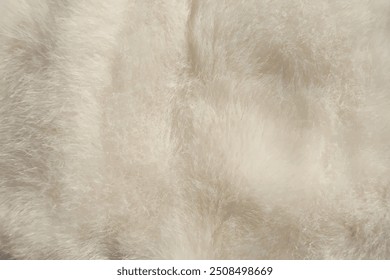 White fur texture background. White fur close up. Artificial white fur.