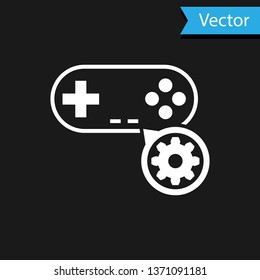 White Gamepad and gear icon isolated on black background. Adjusting app, service concept, setting options, maintenance, repair, fixing. Vector Illustration