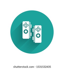 White Gamepad icon isolated with long shadow. Game controller. Green circle button. Vector Illustration