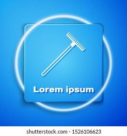White Garden rake icon isolated on blue background. Tool for horticulture, agriculture, farming. Ground cultivator. Housekeeping equipment. Blue square button. Vector Illustration