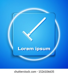 White Garden rake icon isolated on blue background. Tool for horticulture, agriculture, farming. Ground cultivator. Housekeeping equipment. Blue square button. Vector Illustration