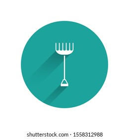 White Garden rake icon isolated with long shadow. Tool for horticulture, agriculture, farming. Ground cultivator. Housekeeping equipment. Green circle button. Vector Illustration