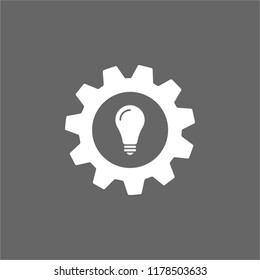 White gear icon with light bulb inside on gray background. Flat vector icon for business.