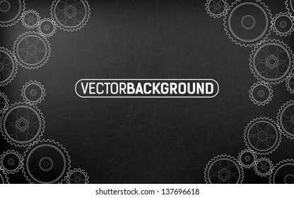 White gears on a dark background
