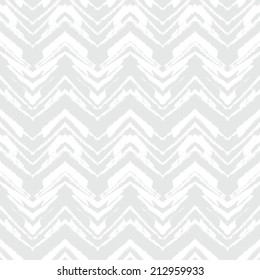 White geometric texture with hand drawn chevrons in silver for Christmas and holiday decor or wedding invitation background. Seamless vector pattern for winter fashion