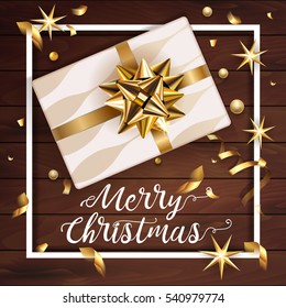 White gift box with a beautiful gold bow. Merry Christmas and Happy New Year greeting card. Vintage Background With Typography and Decoration Elements card Vector, eps 10