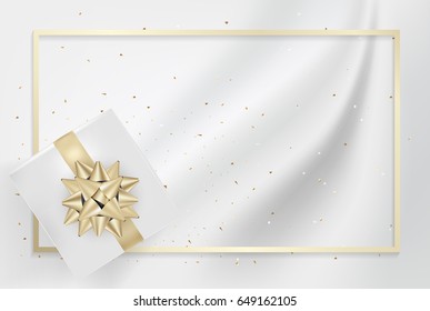 White gift box and gold bow ribbons with confetti on light silk texture background. Vector illustration
