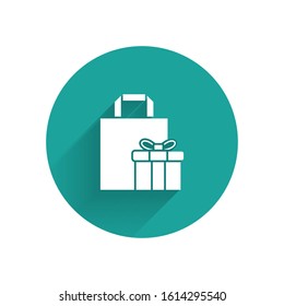 White Gift box icon isolated with long shadow. Green circle button. Vector Illustration