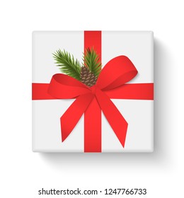 White gift box with red ribbon and bow on white background. Merry Christmas and Happy New Year. Vector illustration