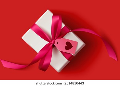 White gift box whit red bow and greeting tag with heart isolated on red background.  Beautiful valentines' day or wedding design element. Vector stock illustration