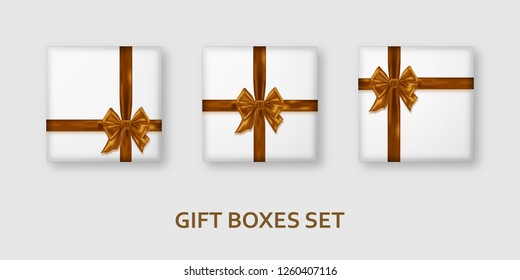 White gift boxes with golden ribbons and bows. Realistic presents isolated on white background. Vector illustration