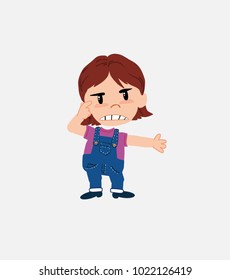 White girl in jeans, is angry and points his head with his index finger.																									