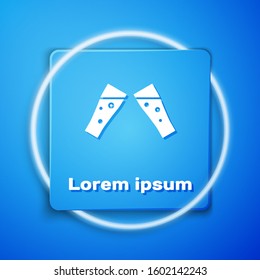 White Glass of beer icon isolated on blue background. Blue square button. Vector Illustration