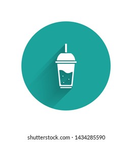 White Glass of lemonade with drinking straw icon isolated with long shadow. Green circle button. Vector Illustration