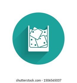 White Glass of whiskey and ice cubes icon isolated with long shadow. Green circle button. Vector Illustration