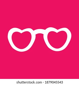 White glasses on the pink background.