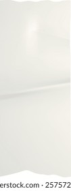White glossy plastic sheet featuring a soft crumpled texture, reflecting light to create a clean, minimalist background ideal for various design applications and presentations
