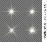 White glowing light explodes on a transparent background. Sparkling magical dust particles. Bright Star. Transparent shining sun, bright flash. Vector sparkles. To center a bright flash.