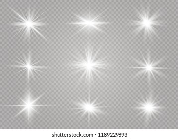 White glowing light explodes on a transparent background. Sparkling magical dust particles. Bright Star. Transparent shining sun, bright flash. Vector sparkles. To center a bright flash.