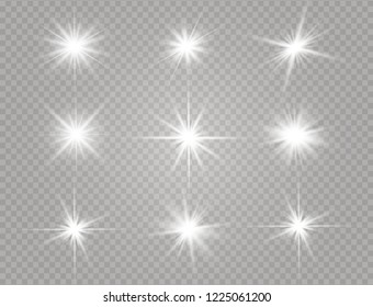 White glowing light explodes on a transparent background. Sparkling magical dust particles. Bright Star. Transparent shining sun, bright flash. Vector sparkles. To center a bright flash.