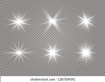 White glowing light explodes on a transparent background. Sparkling magical dust particles. Bright Star. Transparent shining sun, bright flash