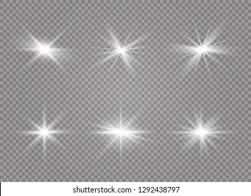 White glowing light explodes on a transparent background. Sparkling magical dust particles. Bright Star. Transparent shining sun, bright flash