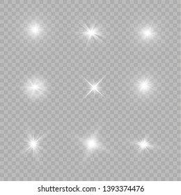 White glowing light explodes on a transparent background. Sparkling magical dust particles. Bright Star. Transparent shining sun, bright flash. Vector sparkles.