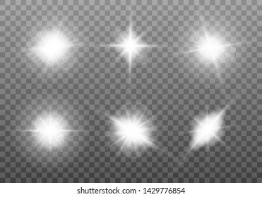 White glowing light explodes on a transparent background. Sparkling magical dust particles. Set of Bright Star. Transparent shining sun, bright flash Vector sparkles To center a bright flash Christmas