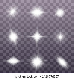 White glowing light explodes on a transparent background. Sparkling magical dust particles. Set of Bright Star. Transparent shining sun, bright flash Vector sparkles To center a bright flash Christmas