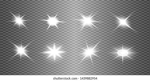 White glowing light explodes on a transparent background. Sparkling magical dust particles. Bright Star. Transparent shining sun, bright flash. Vector sparkles. To center a bright flash