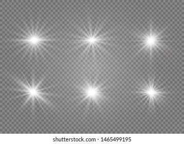 White glowing light explodes on a transparent background. Sparkling magical dust particles. Bright Star. Transparent shining sun, bright flash