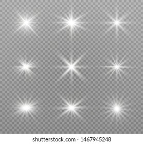 White glowing light explodes on a transparent background. Sparkling magical dust particles. Bright Star. Transparent shining sun, bright flash