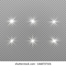 White glowing light explodes on a transparent background. Sparkling magical dust particles. Bright Star. Transparent shining sun, bright flash. Vector sparkles. To center a bright flash.