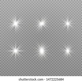 White glowing light explodes on a transparent background. Sparkling magical dust particles. Bright Star. Transparent shining sun, bright flash. Vector sparkles. To center a bright flash.