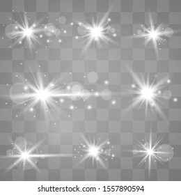 White glowing light explodes on a transparent background. Sparkling magical dust particles. Bright Star. Transparent shining sun, bright flash.