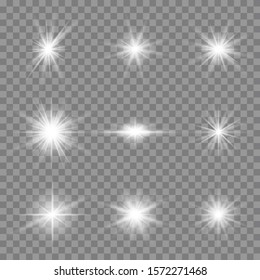 White glowing light explodes on a transparent background. Sparkling magical dust particles. Bright Star. Transparent shining sun, bright flash