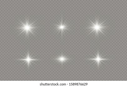 White glowing light explodes on a transparent background. Sparkling magical dust particles. Bright Star. Transparent shining sun, bright flash