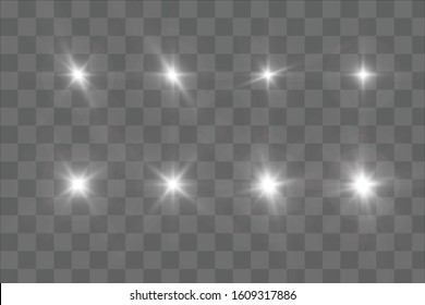 White glowing light explodes on a transparent background. Sparkling magical dust particles. Bright Star. Transparent shining sun, bright flash. Vector sparkles. To center a bright flash.