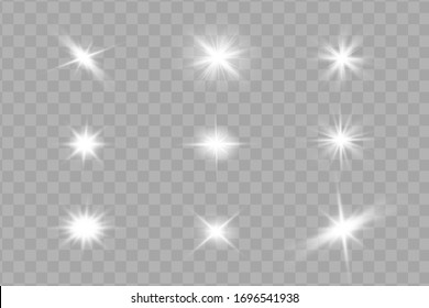 White glowing light explodes on a transparent background. Sparkling magical dust particles. Bright Star. Transparent shining sun, bright flash. Vector sparkles. To center a bright flash