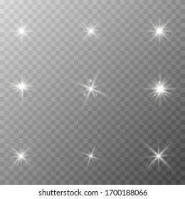 White glowing light explodes on a transparent background. Sparkling magical dust particles. Bright Star. Transparent shining sun, bright flash. Vector sparkles. To center a bright flash.