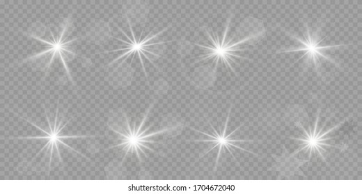White glowing light explodes on a transparent background. Sparkling magical dust particles. Bright Star. Transparent shining sun, bright flash. Vector sparkles.