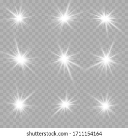 White glowing light explodes on a transparent background. Sparkling magical dust particles. Bright Star. Transparent shining sun, bright flash. Vector sparkles. To center a bright flash.