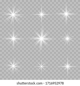 White glowing light explodes on a transparent background. Sparkling magical dust particles. Bright Star. Transparent shining sun, bright flash. Vector sparkles. To center a bright flash.