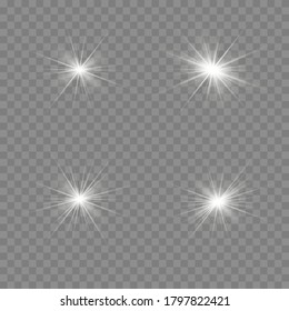 White glowing light explodes on a transparent background. Sparkling magical dust particles. Bright Star. Transparent shining sun, bright flash. To center a bright flash.