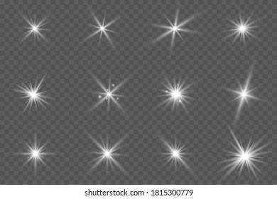 White glowing light explodes on a transparent background. Sparkling magical dust particles. Bright Star. Transparent shining sun, bright flash. Vector sparkles. To center a bright flash.